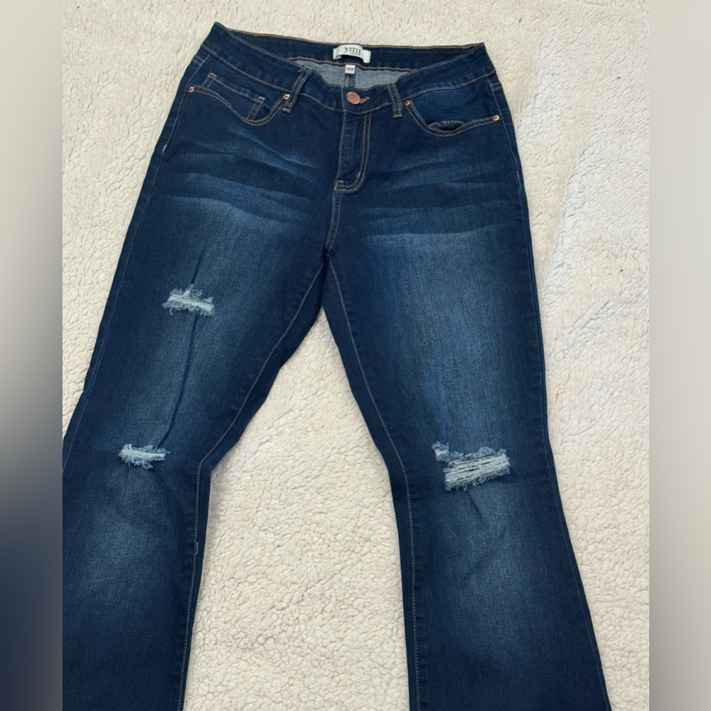Western-style jeans, size 29, blue, flared cut, distressed details and hem slits